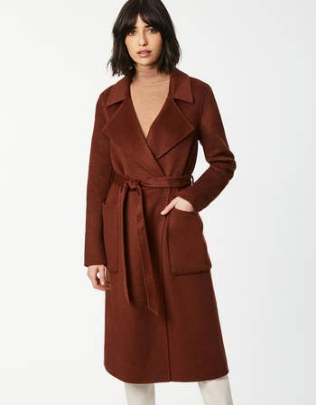 A model in the wrap coat