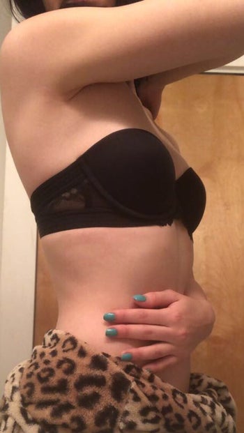 another reviewer wearing the black strapless bra