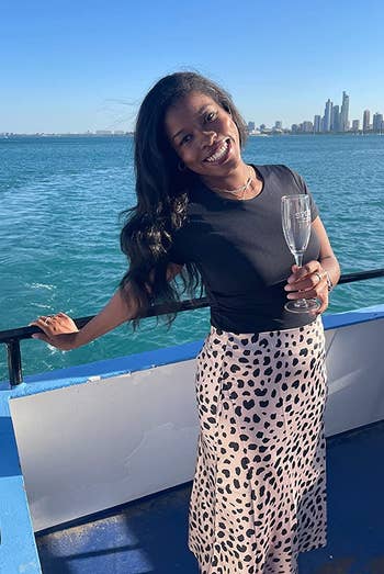Reviewer wearing the leopard people skirt