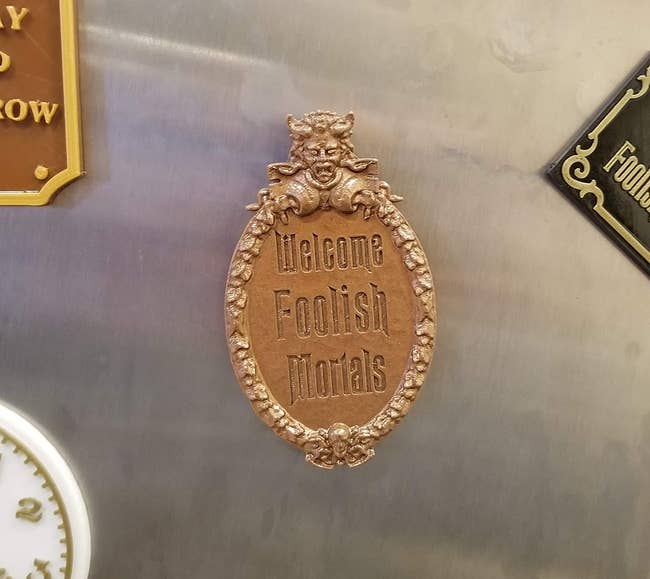 magnet that looks like sign that says welcome foolish mortals