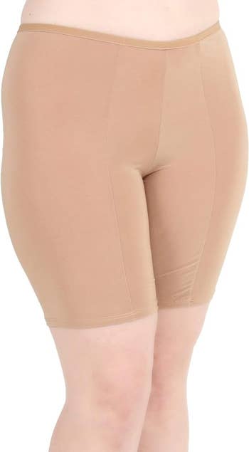 Person in beige anti-chafing shorts