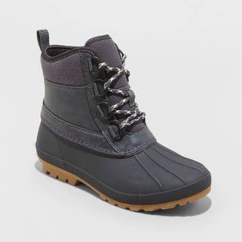 a gray and black winter duck boot