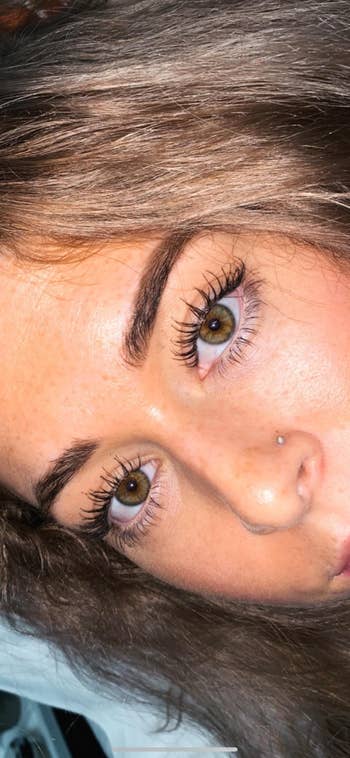 reviewer's super long lashes with essence mascara on