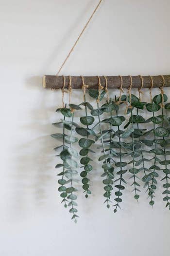 close-up of the fake eucalyptus hanging on a wall