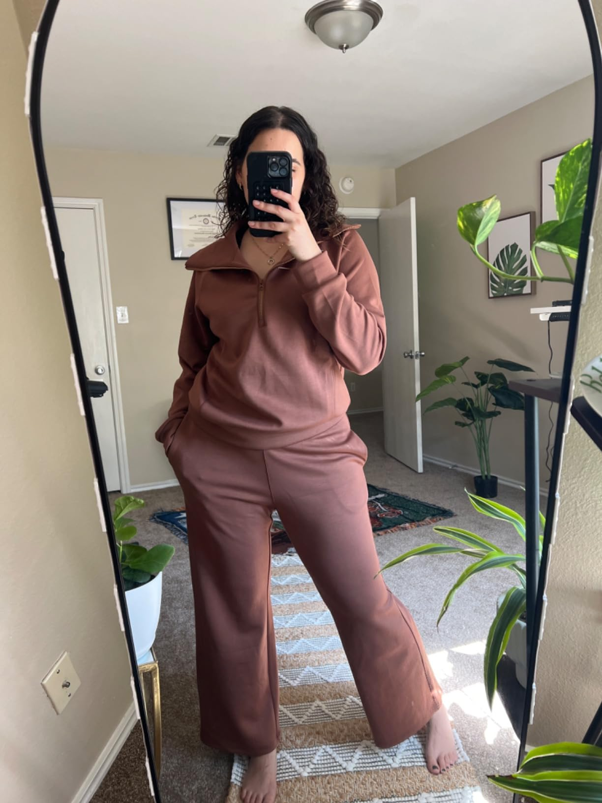 reviewer taking a reflector  selfie wearing the acceptable   successful  brown