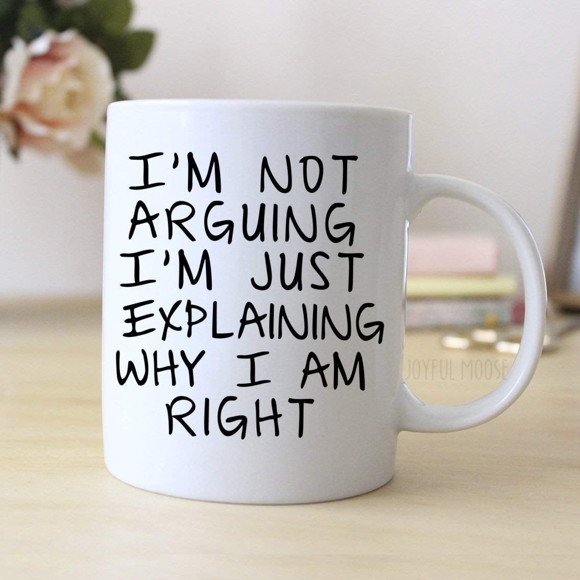 white mug that reads i'm not arguing i'm just explaining why I am right in black text