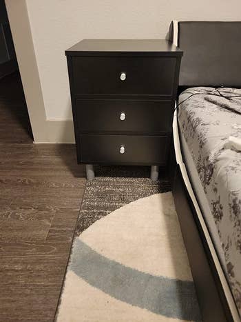 reviewer photo of black three-drawer nightstand