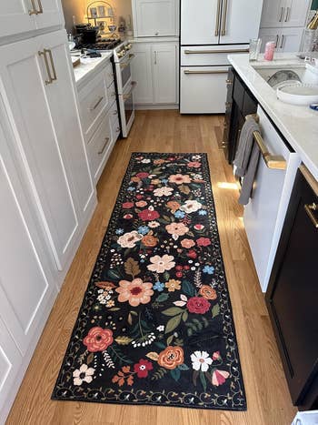 the black rug in a kitchen