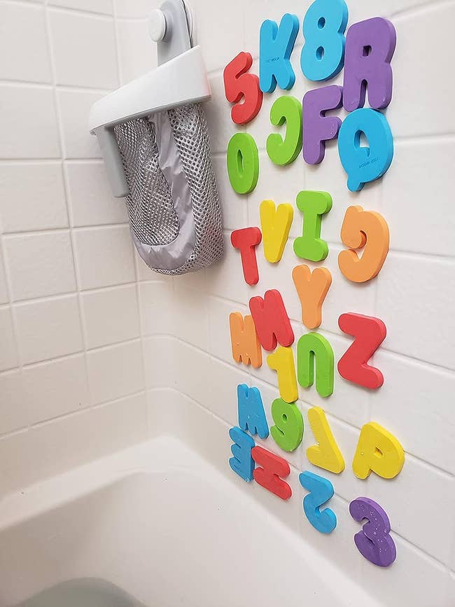 foam letters and numbers on the side of a tub