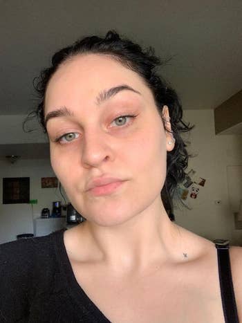 Reviewer showing their glowing skin