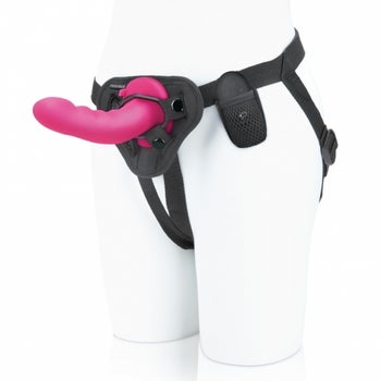 Black harness with pink dildo attached