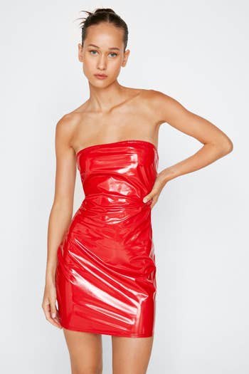 model wearing same dress in red