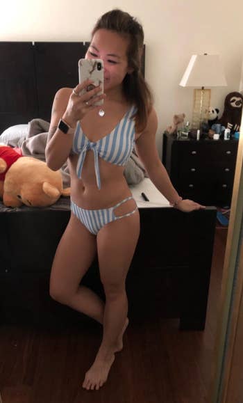 reviewer wearing bathing suit in mirror selfie