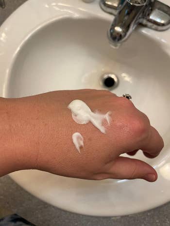 image of a dollop of the eye cream on a reviewer's hand