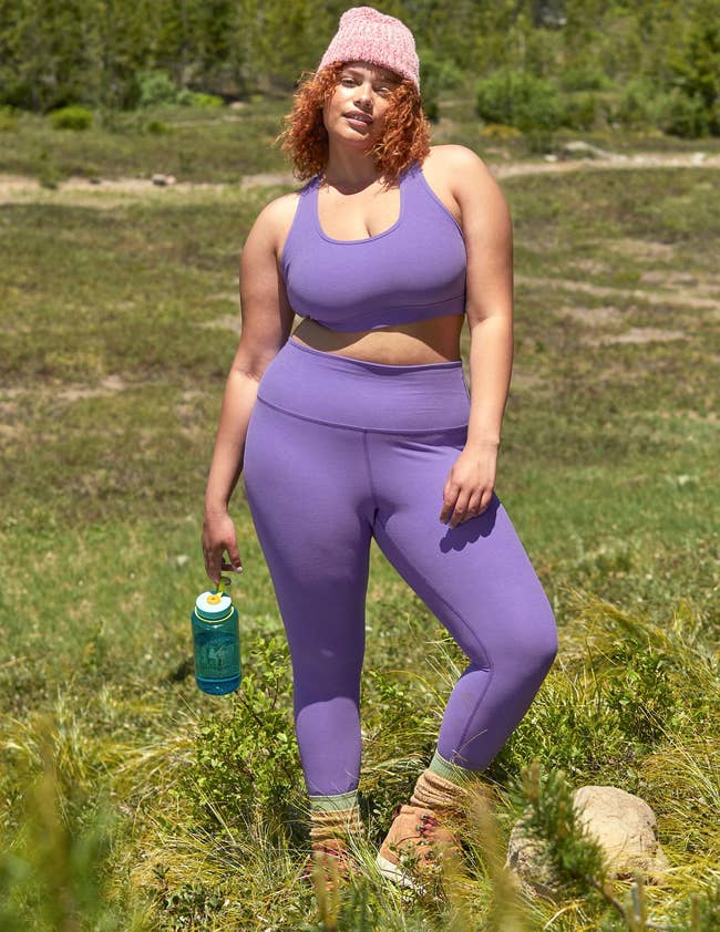 model wearing the leggings in purple