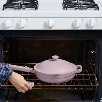 the lilac pan being taken out of an oven