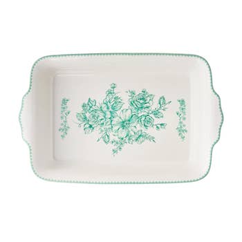 Rectangular ceramic serving platter with floral plan  successful  the center, suitable for eating  oregon  decorative use