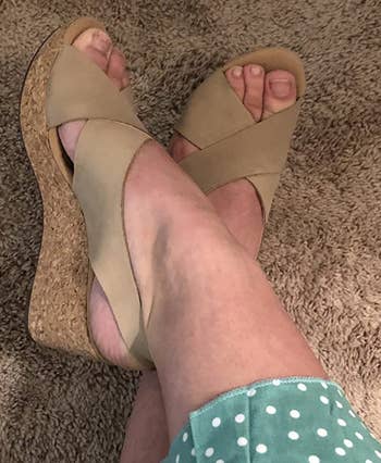 Reviewer wearing Clarks sandals in 