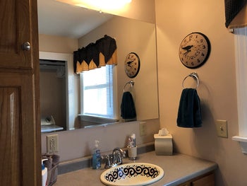 reviewer's spotless bathroom mirror