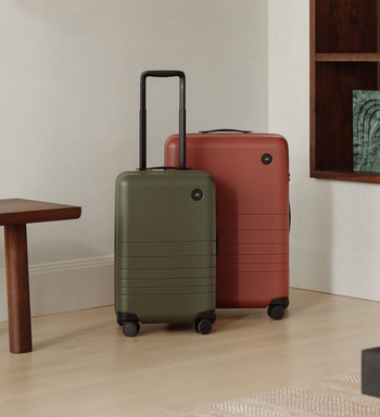 product image of green and terracotta suitcases