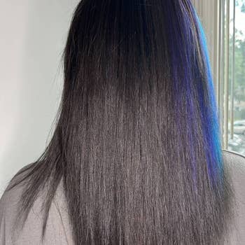 Straightened hair after using the product showing smoother hair
