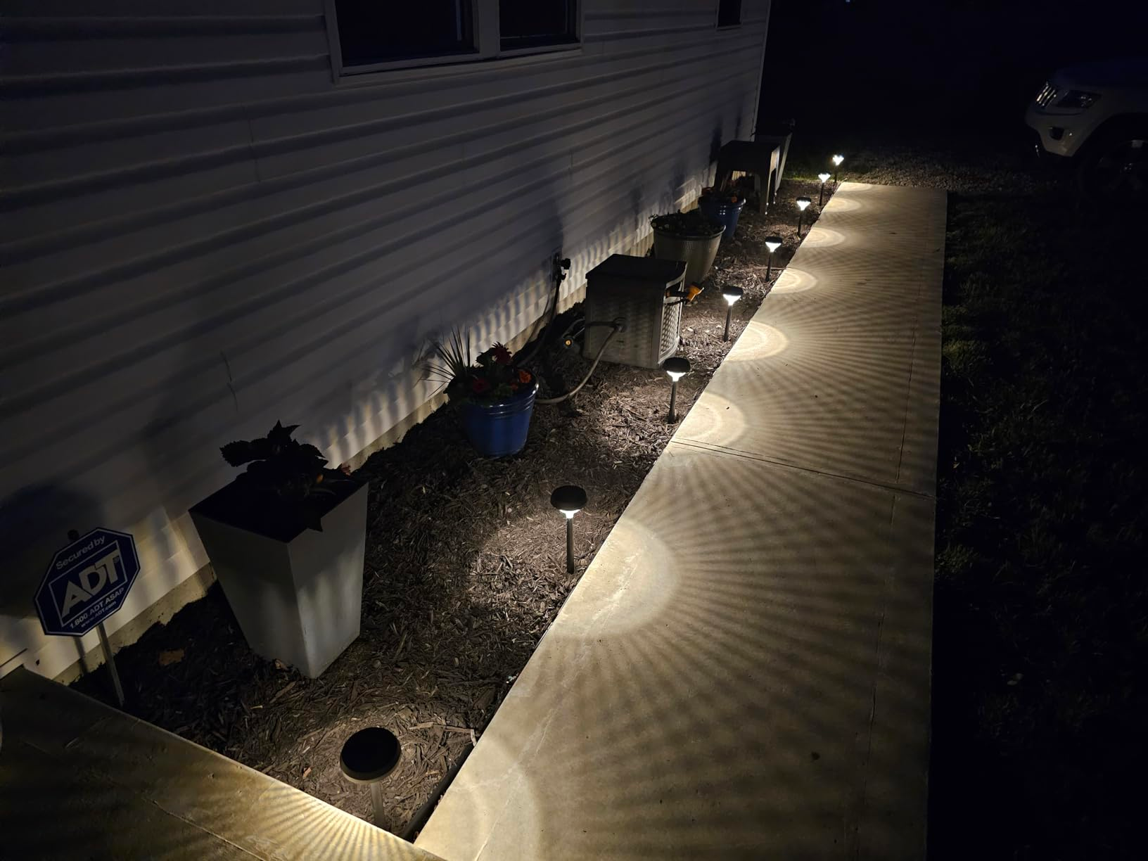Outdoor path with modern solar garden lights