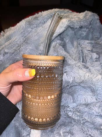 a reviewer's beaded glass drinking cup