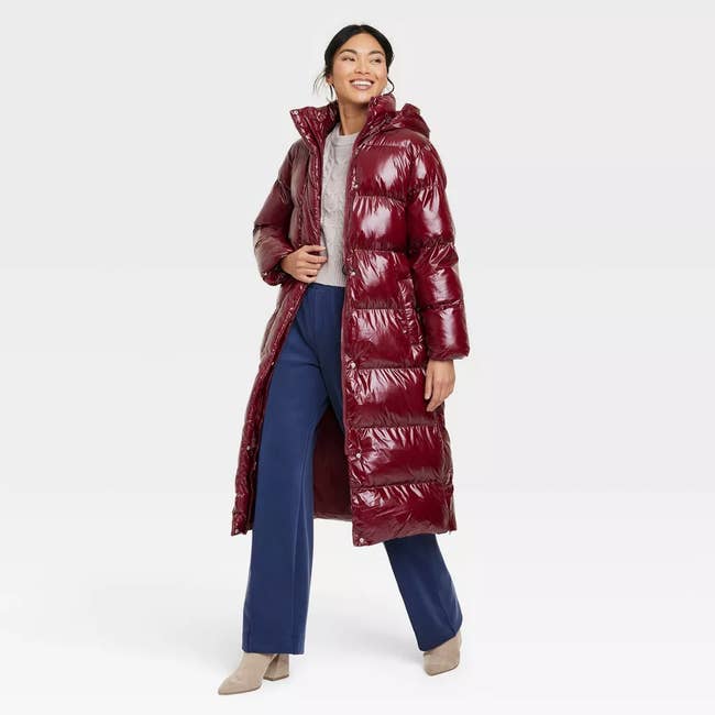 model wearing midi length puffer coat