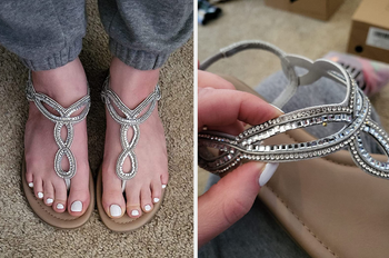Reviewer wearing silver sparkly t-strap gladiator sandals in gray sweatpants, close-up of reviewer holding the strap of product