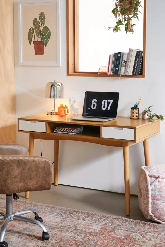 the light brown modern desk with two white pull out drawers