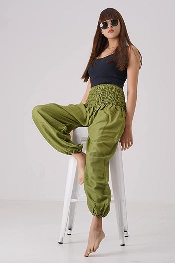 model wearing the green pants