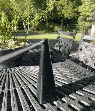 sleek black outdoor fan that faces upwards 