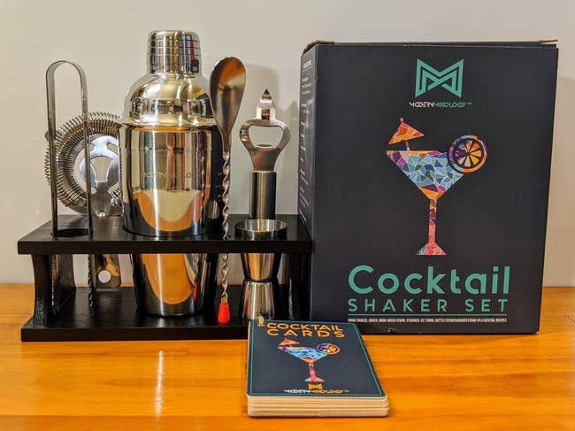reviewer image of the full bartender set next to the deck of recipe cards