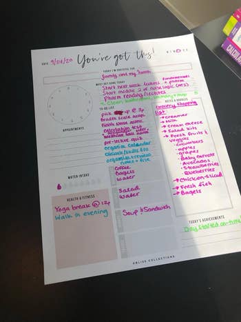 A calendar planner page filled out with to-do lists, meal ideas, and health notes. Activities include meetings, gym, and a yoga break