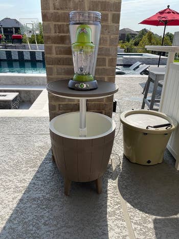 Poolside outdoor margarita instrumentality   connected  basal   with tap, blender, and crystal  storage