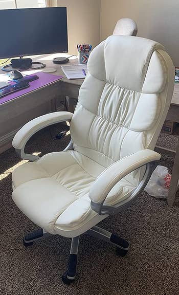 a reviewer photo of the chair in white 