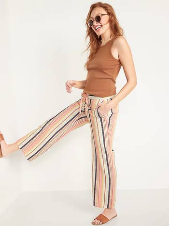 front of model wearing the striped pants