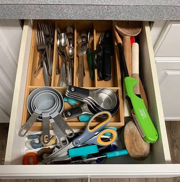 reviewer's disorganized kitchen drawer