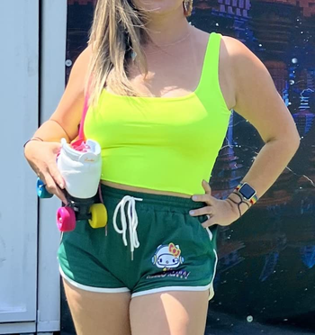 Image of reviewer wearing green neon top