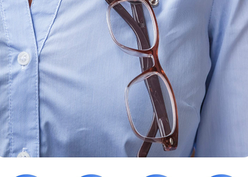 model wearing their glasses on their readerest clip