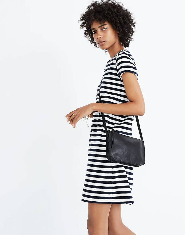 model wearing the simple crossbody bag in black