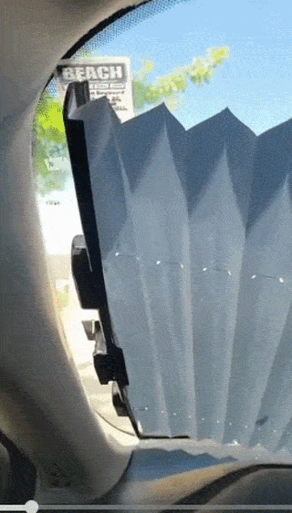 A reviewer using the retractable sun shade