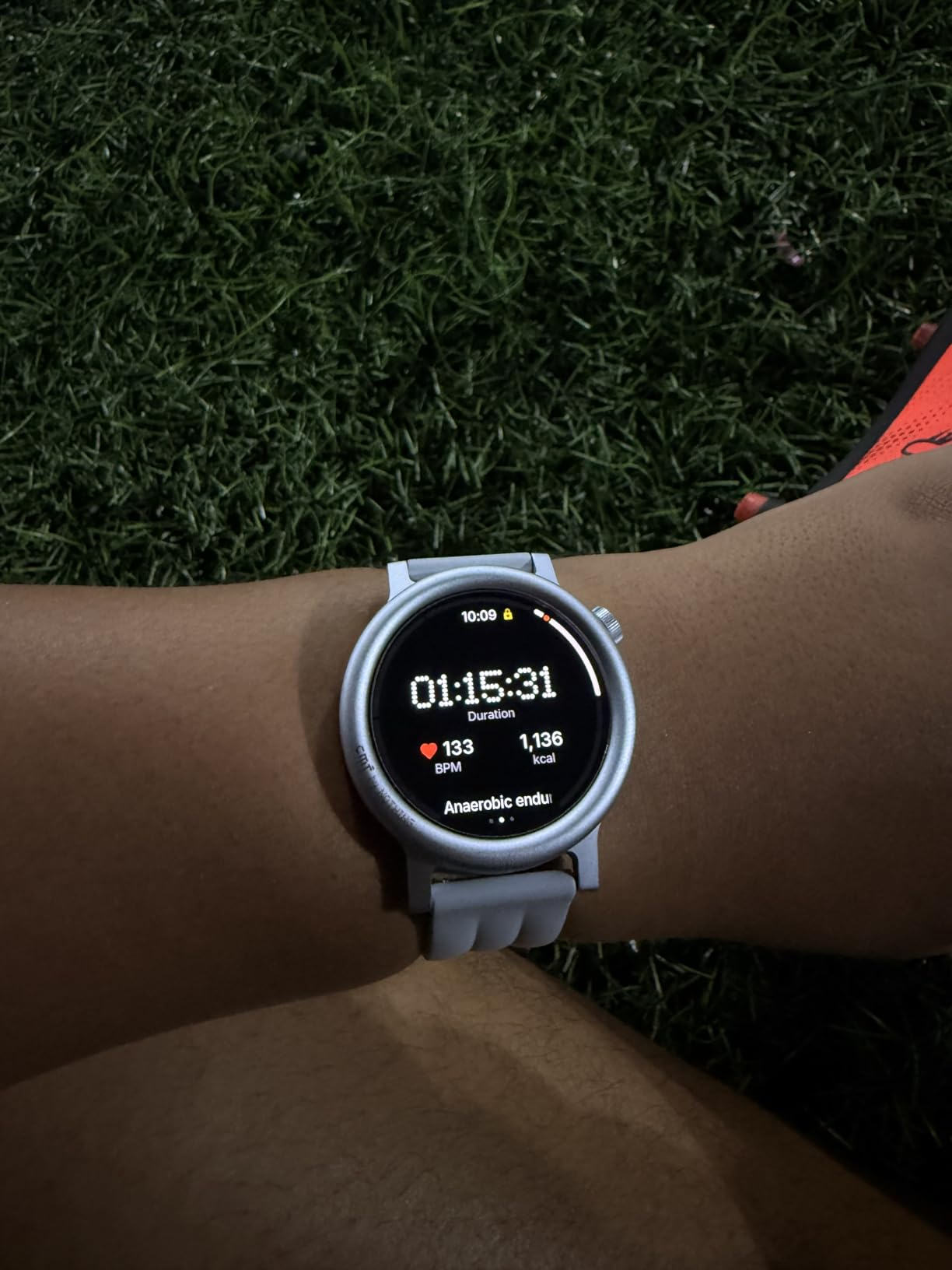 different reviewer wearing the ticker  successful  achromatic  with a timer and wellness  info visible