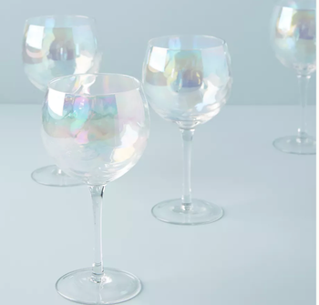 Four glasses on a table 