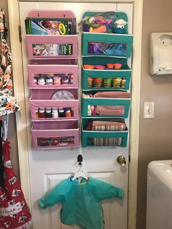 a different reviewer's pink and green organizers holding kid's art supplies