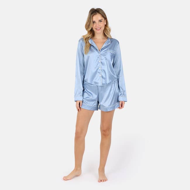 model wearing light blue silk pajama shorts set
