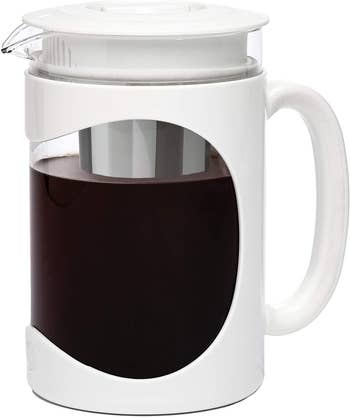 Image of product with lid on and cold brew coffee inside on a white background