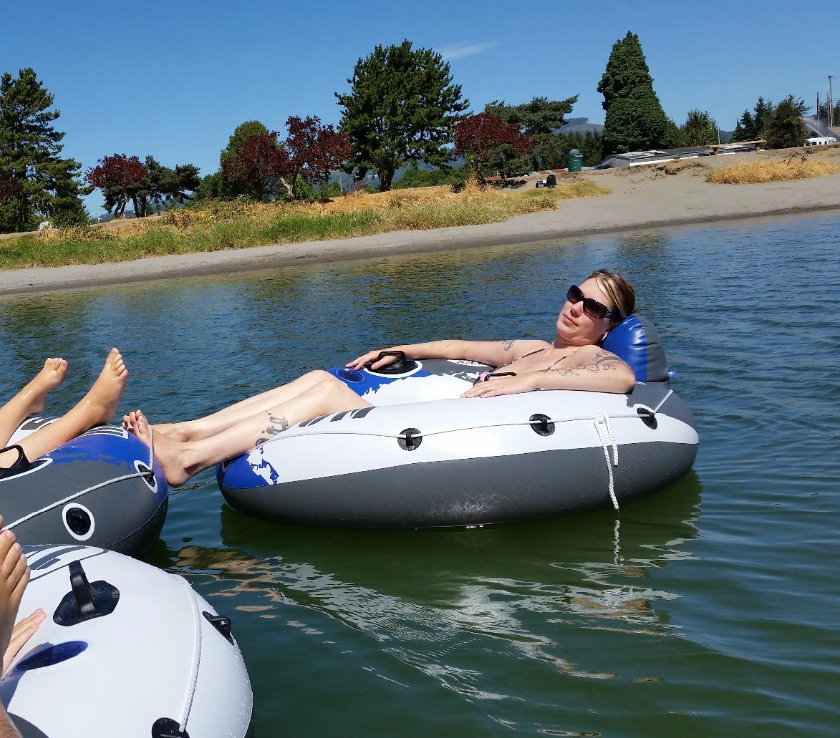 Reviewer is in the river tube on water