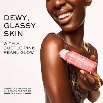 Woman holding skincare product, smiling. Text promotes 