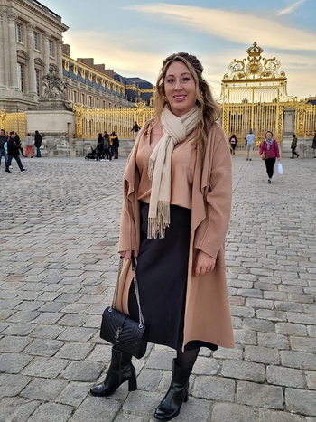 reviewer wearing the skirt in black